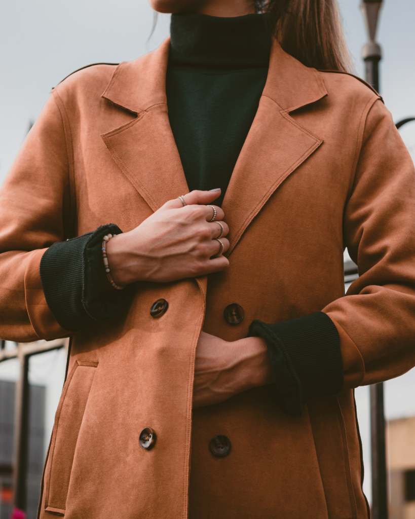 Girl wearing a stylish coat from Lily and Lace online fashion boutique